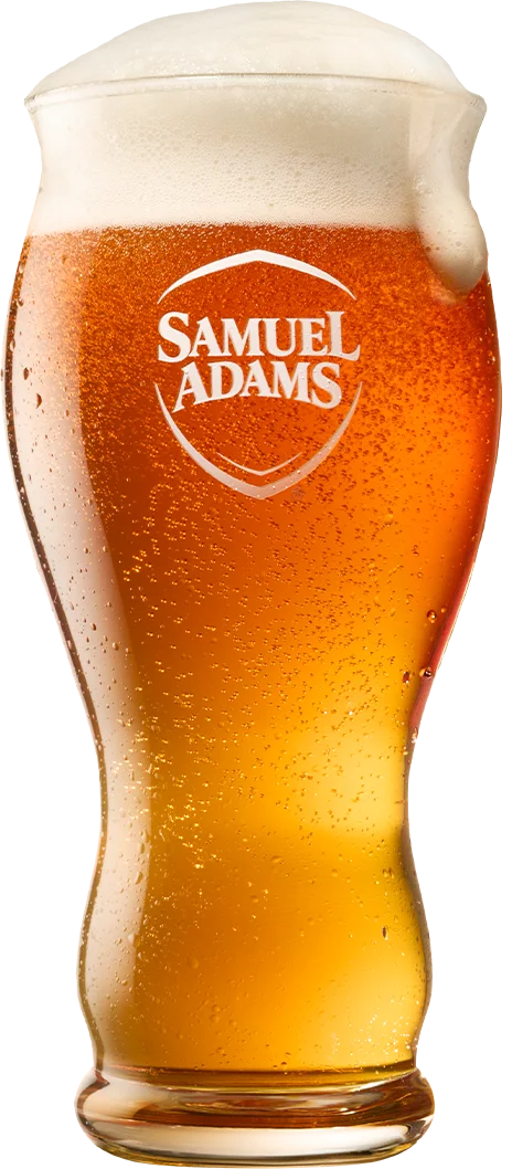A cold Samuel Adams beer in a branded glass
